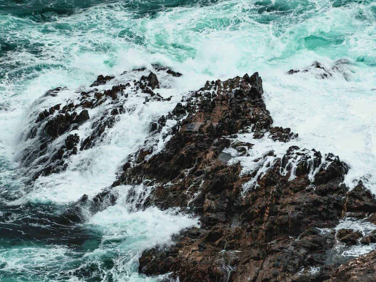 Waves crashing over rocks